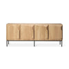 oak sideboard with four geometric shaped doors and six thin black metal legs