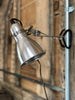 Aluminium shaded light with a large clip to fix the light anywhere you want. Black plastic flex.